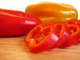 Sweet pepper sliced ??on a cutting board, isolation