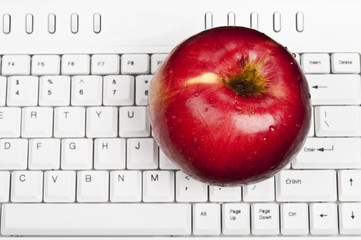 Apple on keyboard