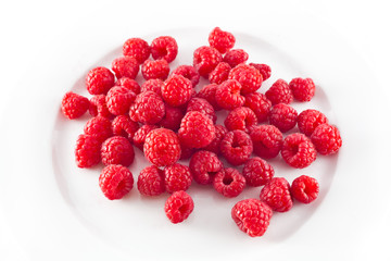 fresh raspberries on a plate