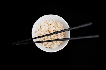 Bowl of rise with chopsticks