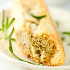 Baked baguette with herbs