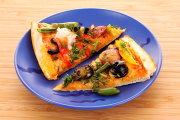 Pizza with  salami on the plate