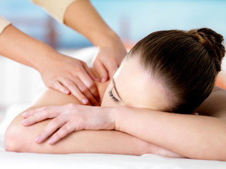 Fototapeta na wymiar Woman relaxing on spa massage
