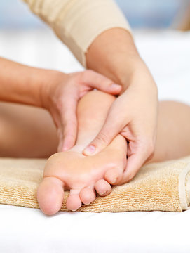 Massage for foot in spa salon