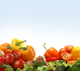 A border made of fresh and tasty vegetables