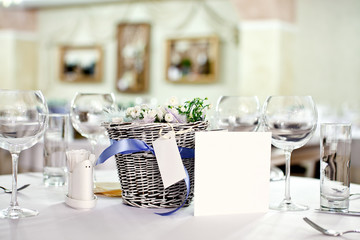 Ornament of a festive table a flowers basket