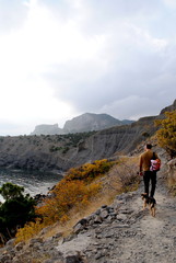 man and dog travel together