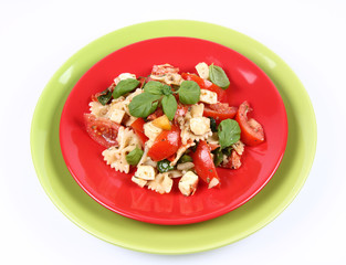 Salad - made of farfalle pasta, tomato, salami and mozzarella