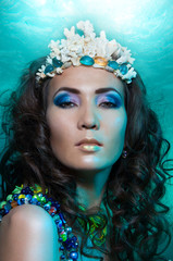 Mermaid queen in coral crown