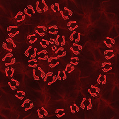 Spiral red footprints descending to hell on dark background