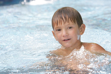young boy swimming