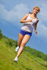 running girl on green grass