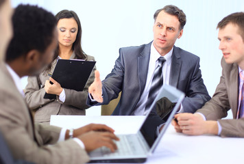Portrait of senior business man discussing a new