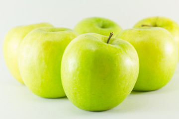 Green apples isolated on white background