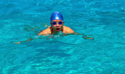 Gal swimming in a pool