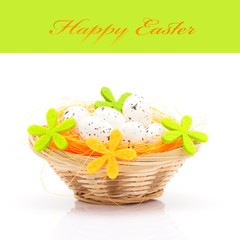 Fototapeta na wymiar Easter eggs in basket