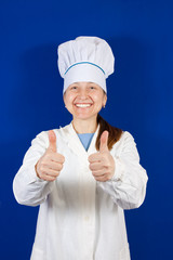 Senior cook woman in toque