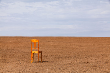 The restless chair on the spring field