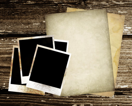 vintage paper and photo on wood background