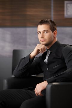 Handsome businessman waiting