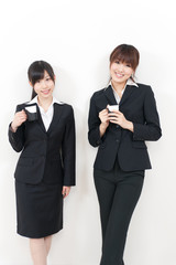 two asian businesswomen relaxing