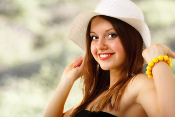 summer young woman cheerful in panama enjoying isolated on white