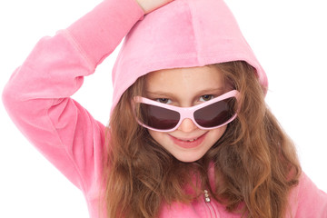 Young girl with pink sunglasses and hood