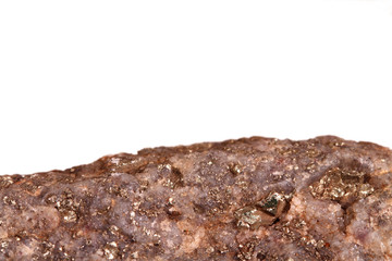 iron pyrite nuggets embedded in rock, white space