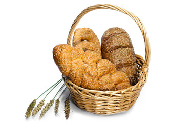 Basket with bread on white background
