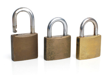 Fototapeta premium Three security gold locks