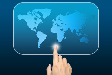 hand pushing a world map on a touch screen interface