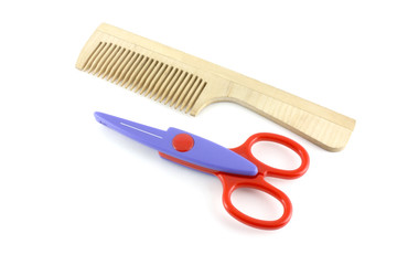 Wooden comb and scissors