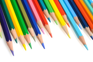 Many colorful school pencils isolated on white background