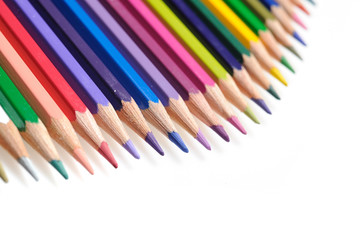 Many colorful school pencils isolated on white background