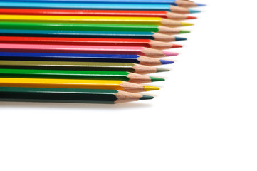 Many colorful school pencils isolated on white background
