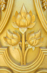 lotus carved gold paint on temple door