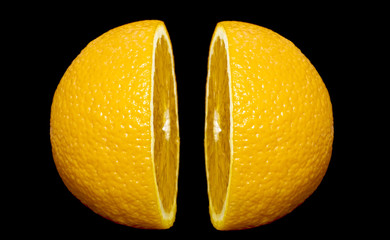 Two halves of orange isolated over black