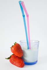 milk with straw and strawberries