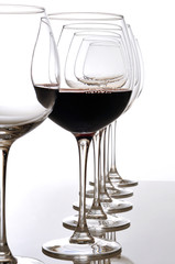 red wine glass and empty glasses