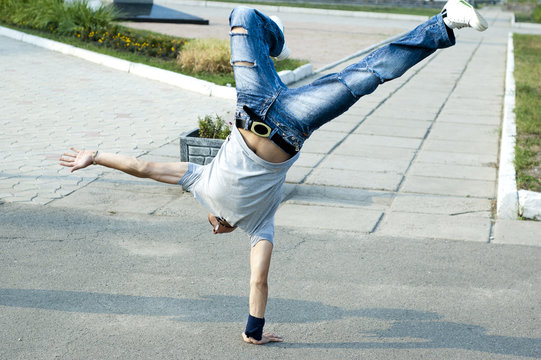 Guy dancing break-dancing in the street