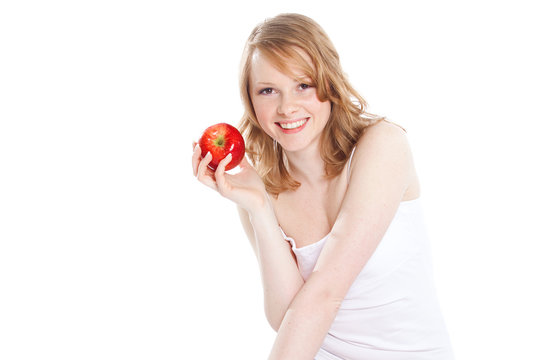 Portrait of beautiful girl with apple