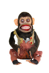Mechanical chimp with ripped vest, uneven eyes