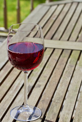 Red wine on patio table