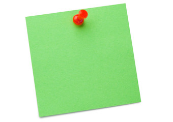 Green post-it with drawing pin