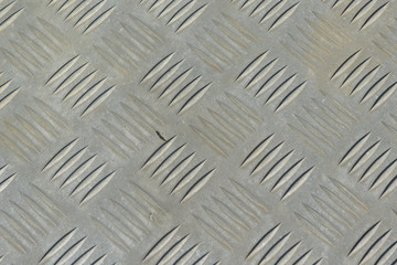 fond métal caillebotis