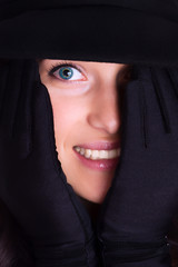 Portrait of a beautiful brunette young woman smiling