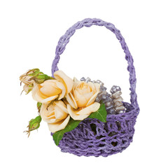 Wedding boutonniere and beads in a wicker basket isolated on a w