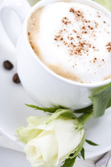 cup of coffee and rose