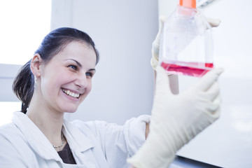portrait of a female researcher doing research in a lab