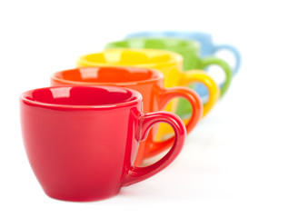 Colorful cups on a white background
